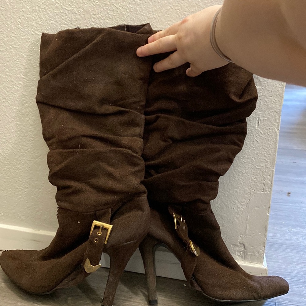Brown heal boots, have a little wear and tear from moving but only worn twice